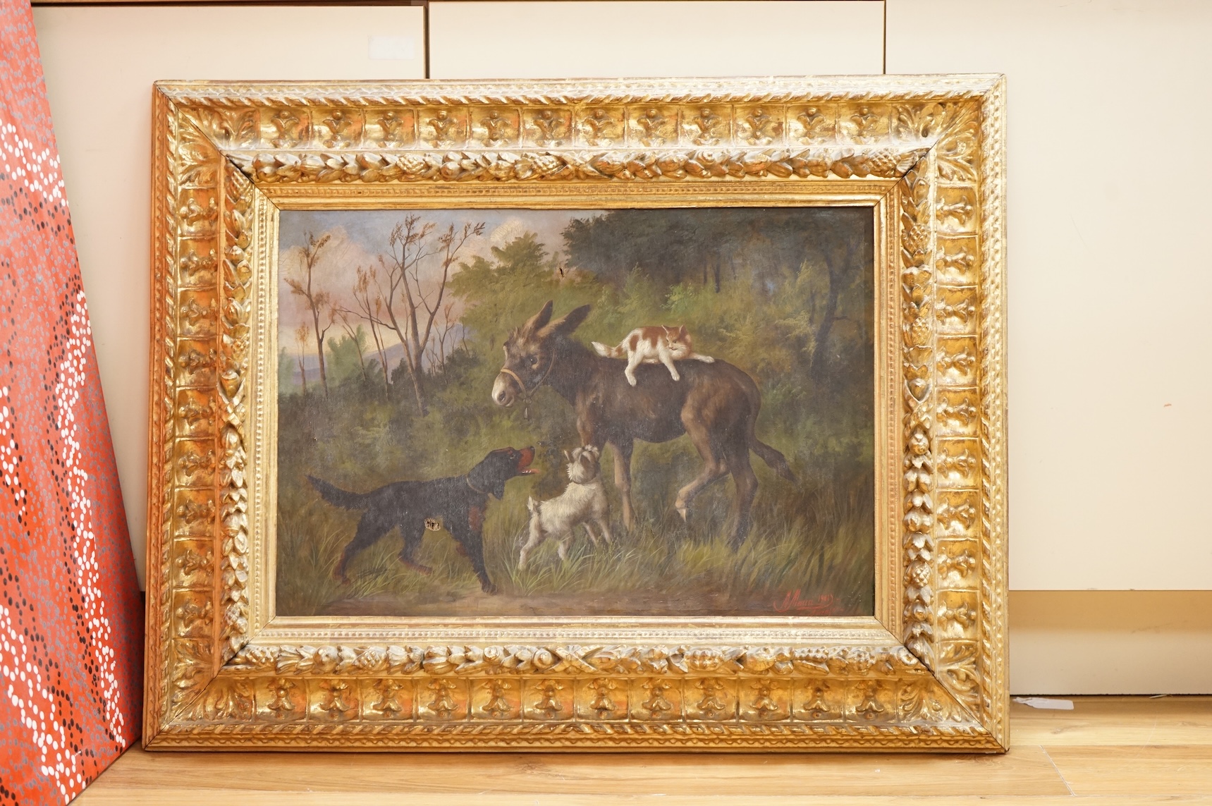 Michelangelo Meucci (Italian, 1840-1909), Study of a donkey, cat and dogs before a landscape, signed and dated 1901, oil on canvas, 44 x 64cm, ornate gilt frame